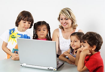 teach with students viewing a laptop