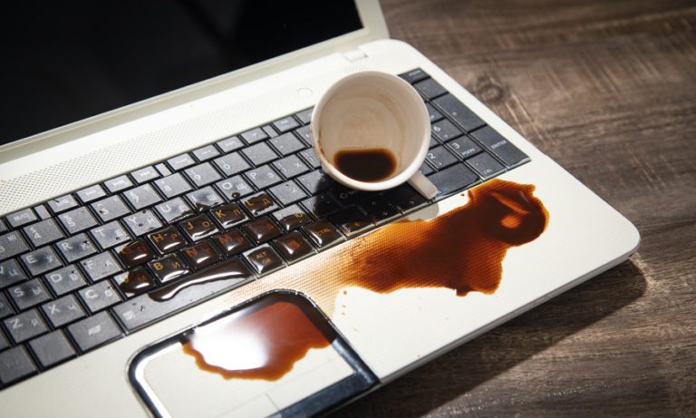 coffee spilled on laptop - Forerunner Computer Systems Adelaide
